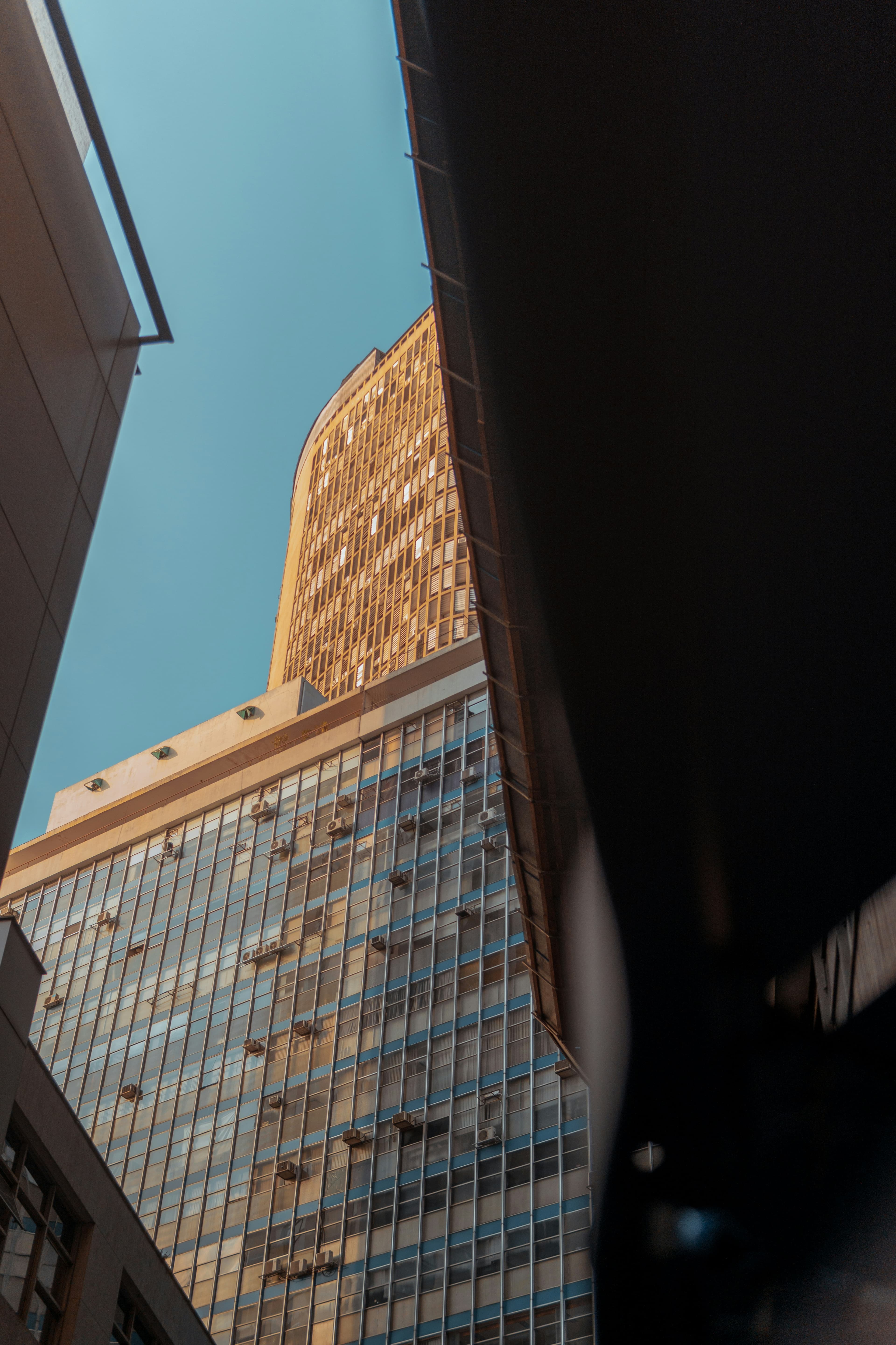 Golden glass tower viewed from below